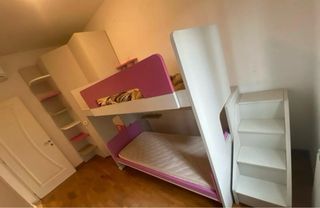 Letti a castello con cabina armadio.