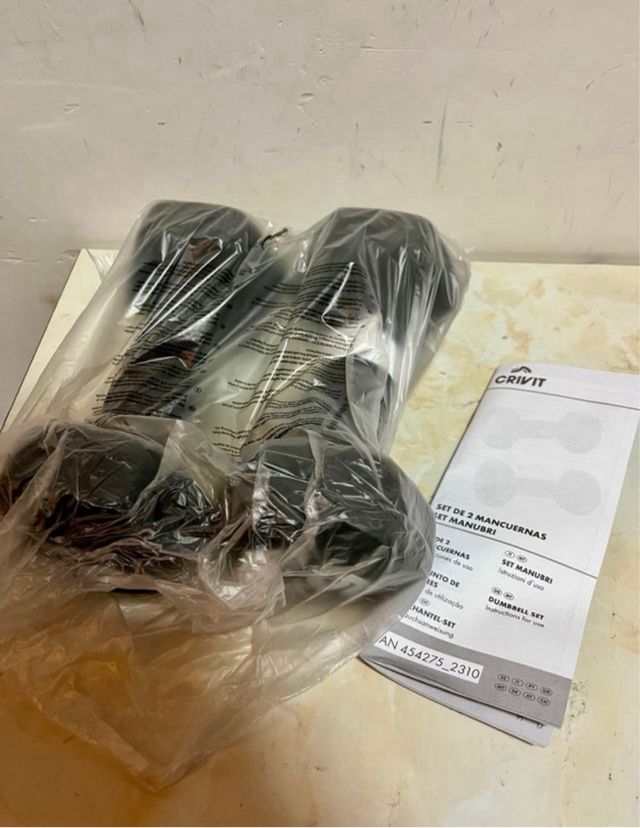 Manubri da 5kg nuovi con rivestimento in gomma