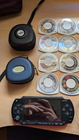 PSP 1004 negra + juegos