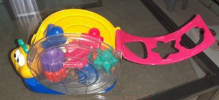 Caracol musical Fisher-Price con bloques