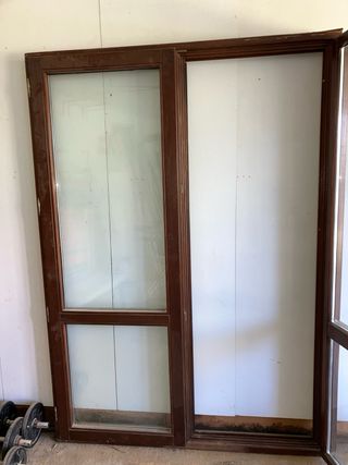 Balcón de madera Iroko con cristales de camara