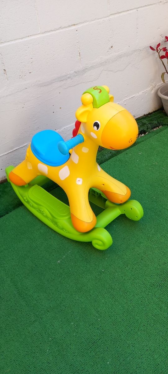 JUGUETE BALANCIN JIRAFA MUSICAL