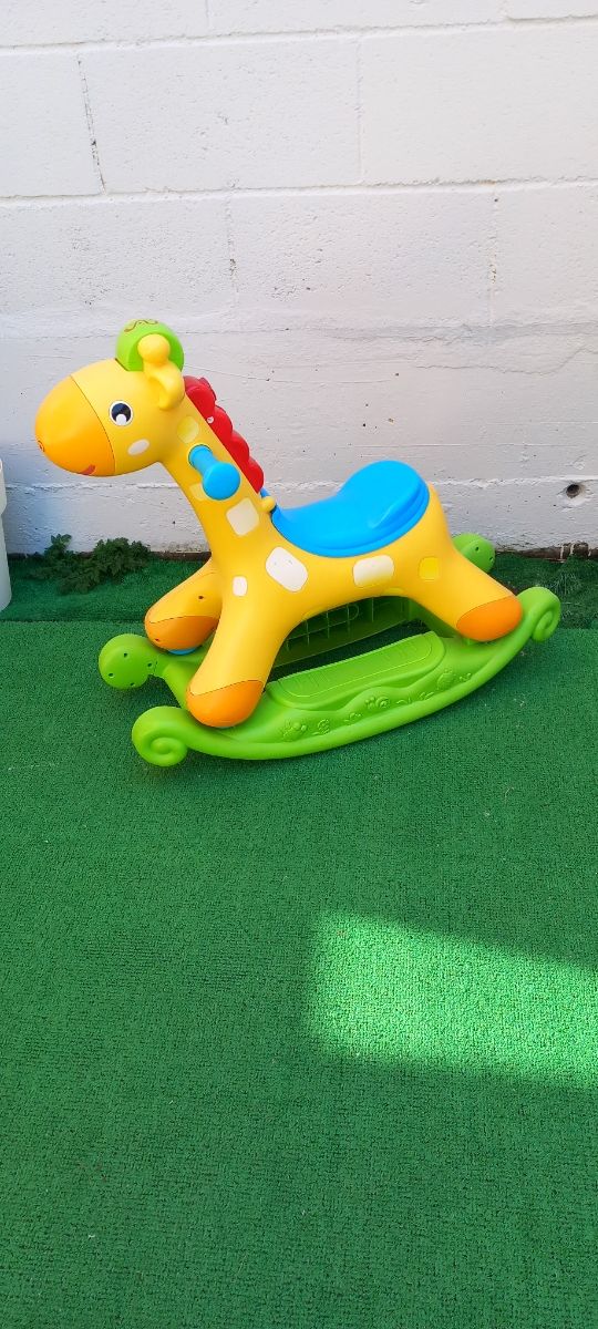 JUGUETE BALANCIN JIRAFA MUSICAL