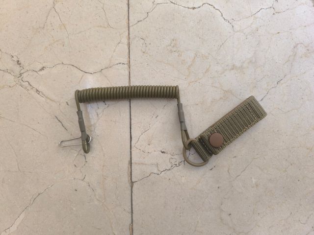 Sujeta armas - cuerda elástica