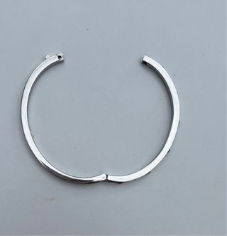 Pulsera brazalete de acero y circonitas, Lotus.