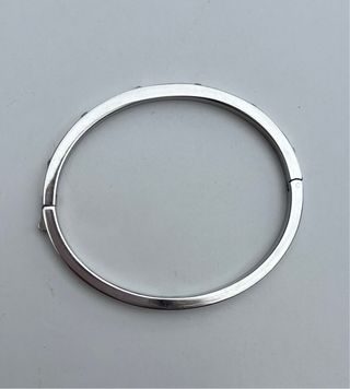 Pulsera brazalete de acero y circonitas, Lotus.