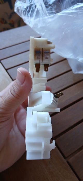 Sistema cierre puerta microondas