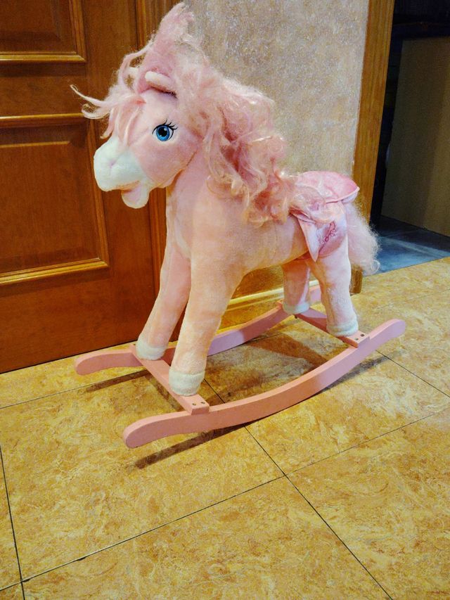 Caballo mecedora rosa infantil