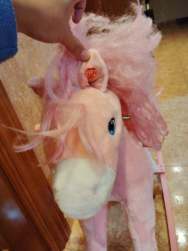 Caballo mecedora rosa infantil