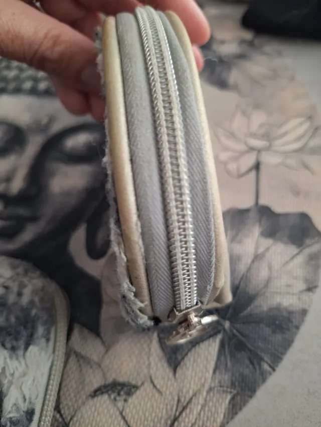 2 Monederos Cruella gris