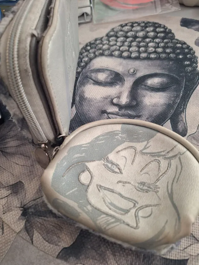 2 Monederos Cruella gris