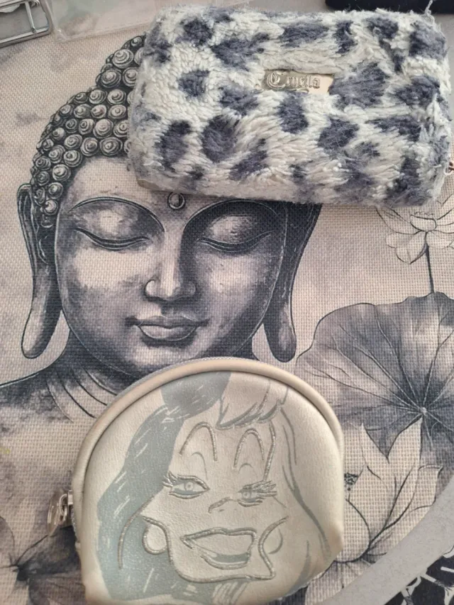 2 Monederos Cruella gris