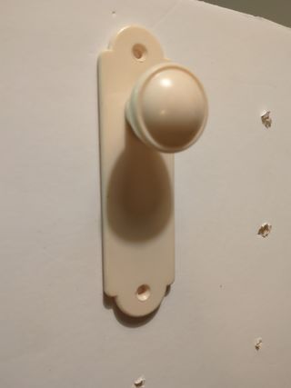 Pomo fijo de puerta. Vintage, de plástic