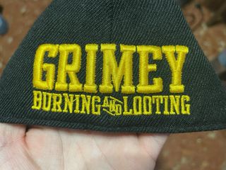 Gorra Grimey negra y dorada