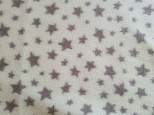 Mantita bebé estrellas beige. 1,20 x 80