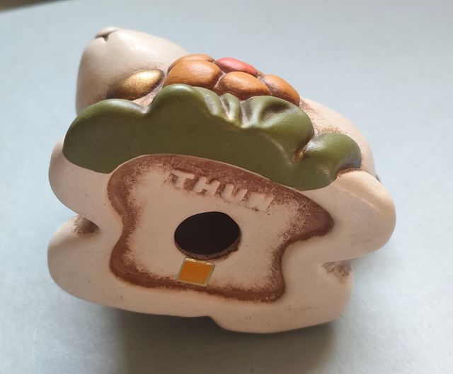 Thun Coniglio beige e oro con fiore