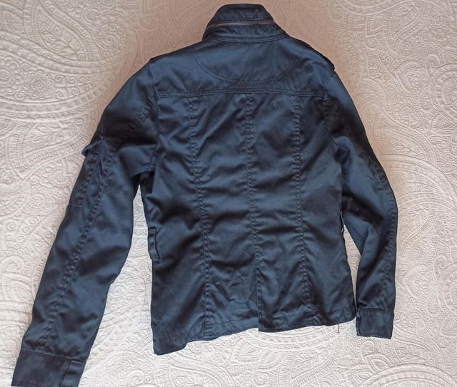 Cazadora vaquerra negra