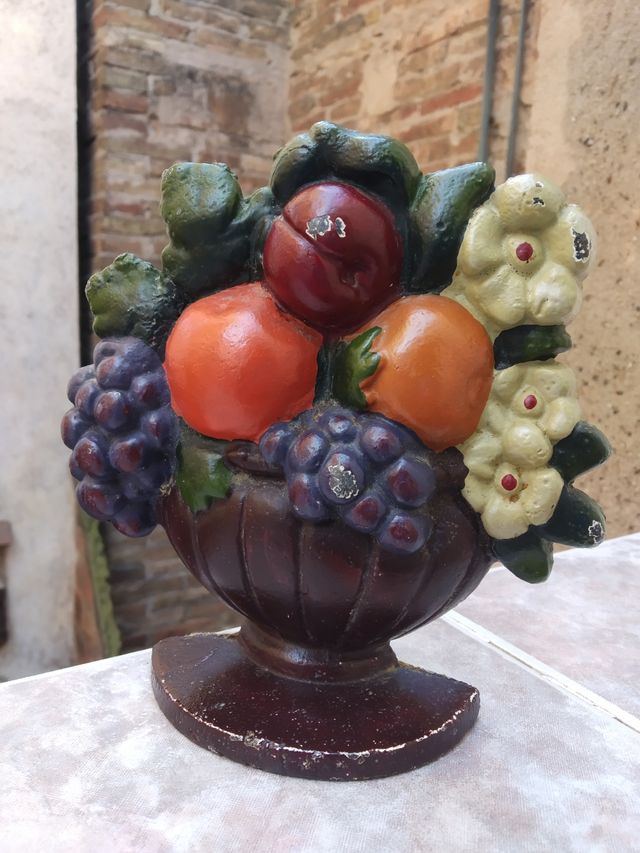 Limitador de porta antigo de ferro fundido