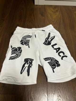 camiseta y pantalón blancos y negros lacoste