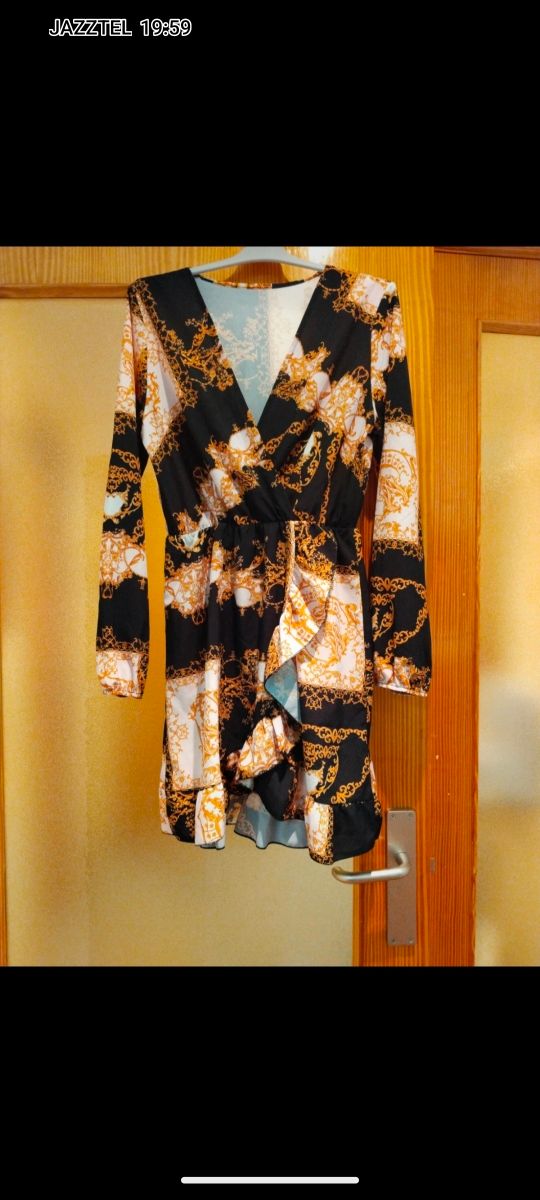 Vestido negro y dorado talla L