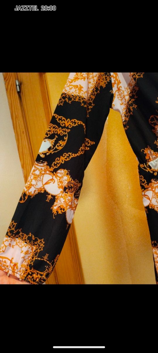 Vestido negro y dorado talla L