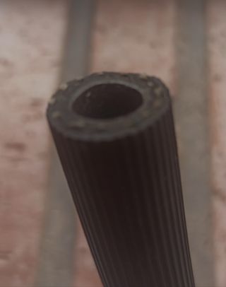 Llave 21 p/ bujías. y tubo de goma extractor.