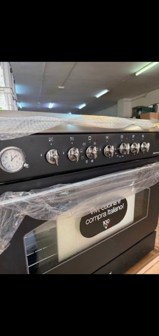 Cocina Bompani 5 fuegos gas + horno eléctrico.