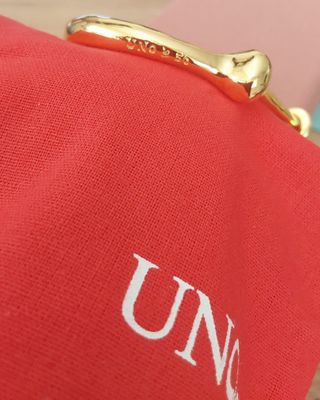 Brazalete UNode50 dorado