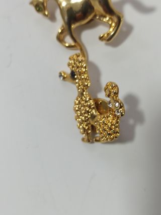 Anillo y broches dorados Swarovski lote 50 euros 