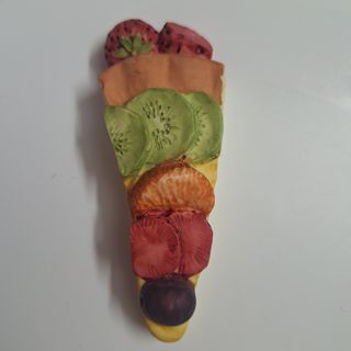 Scultura in resina Nadir torta alla frutta