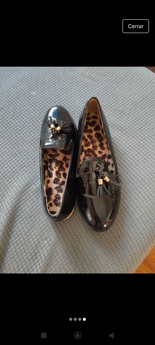 Mocasines negros con borlas