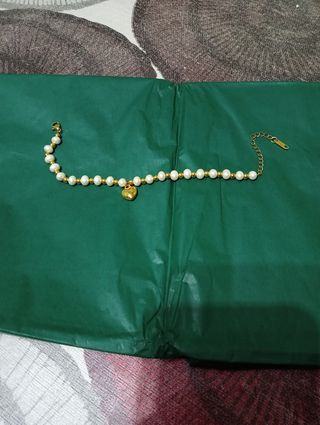Pulsera corazón oro blanco