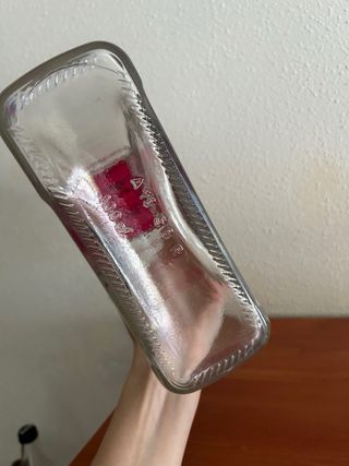 Bottiglia antica triangolare vintage