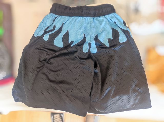 Pantalon baloncesto llamas