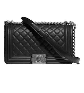 La borsa Chanel 2.55 Black, vintage, è stata usata per anni