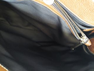 Bolso de piel marrón. Purificación García.