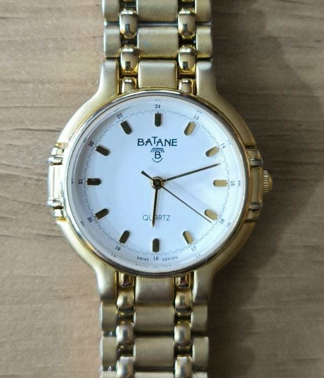 Reloj Batane cuarzo dorado