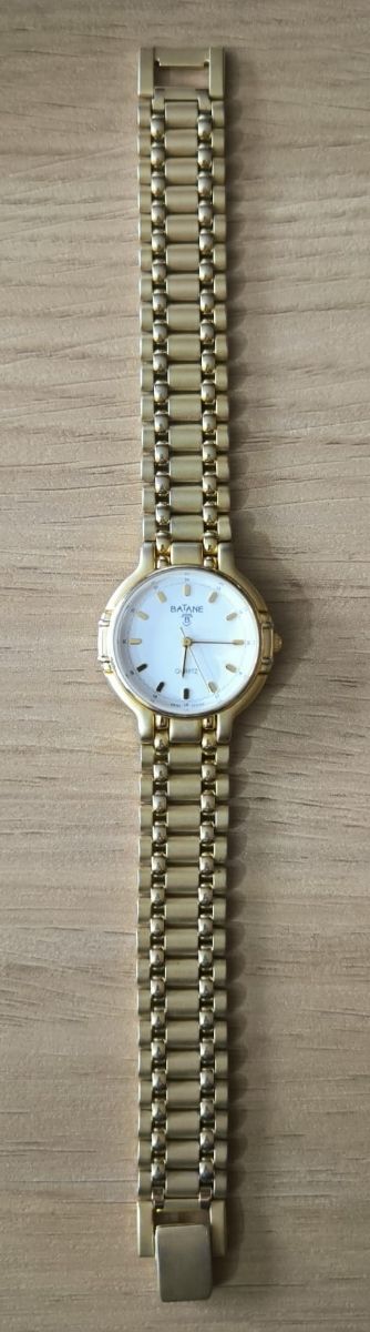 Reloj Batane cuarzo dorado