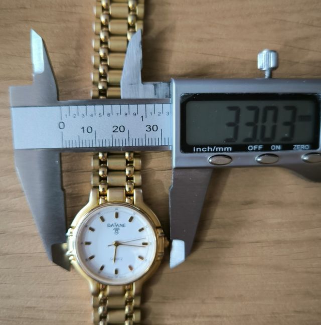 Reloj Batane cuarzo dorado
