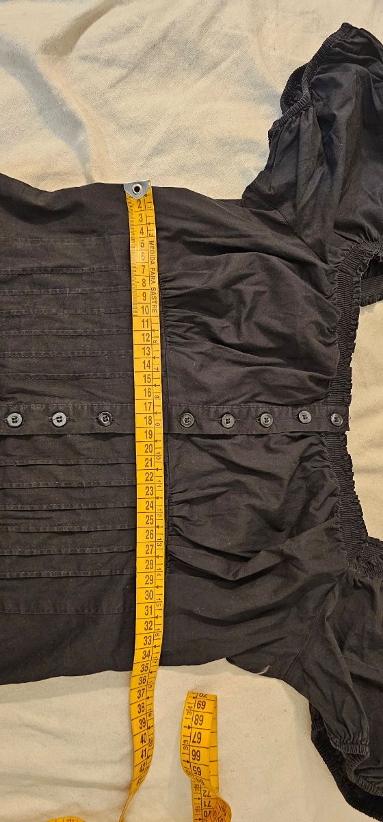 Coqueto top negro Caroll