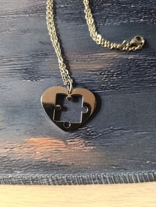 Collar corazón puzzle acero