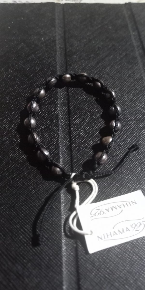 Bracciale cotone e perle regolabile 