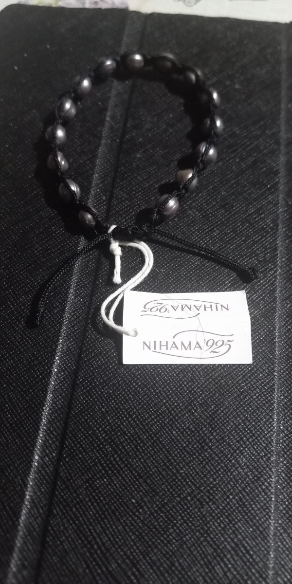 Bracciale cotone e perle regolabile 