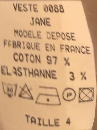Conjunto chaqueta y pantalón blanco pedrería 