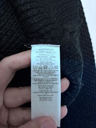 Jersey negro con flecos de “El Corte Inglés “