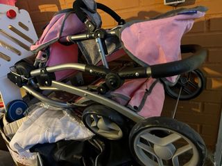 Coche gemelar muñecas Juguettos “Bebe mimitos”. 