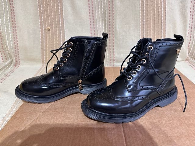 Botas charol XTI