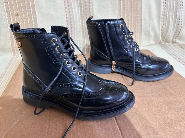 Botas charol XTI