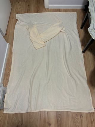 Manta beige con mangas