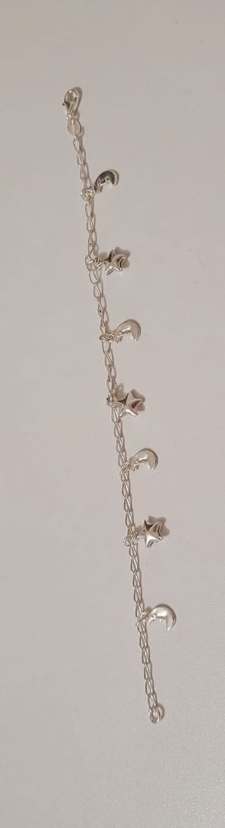 Pulsera de plata con dijes colgant